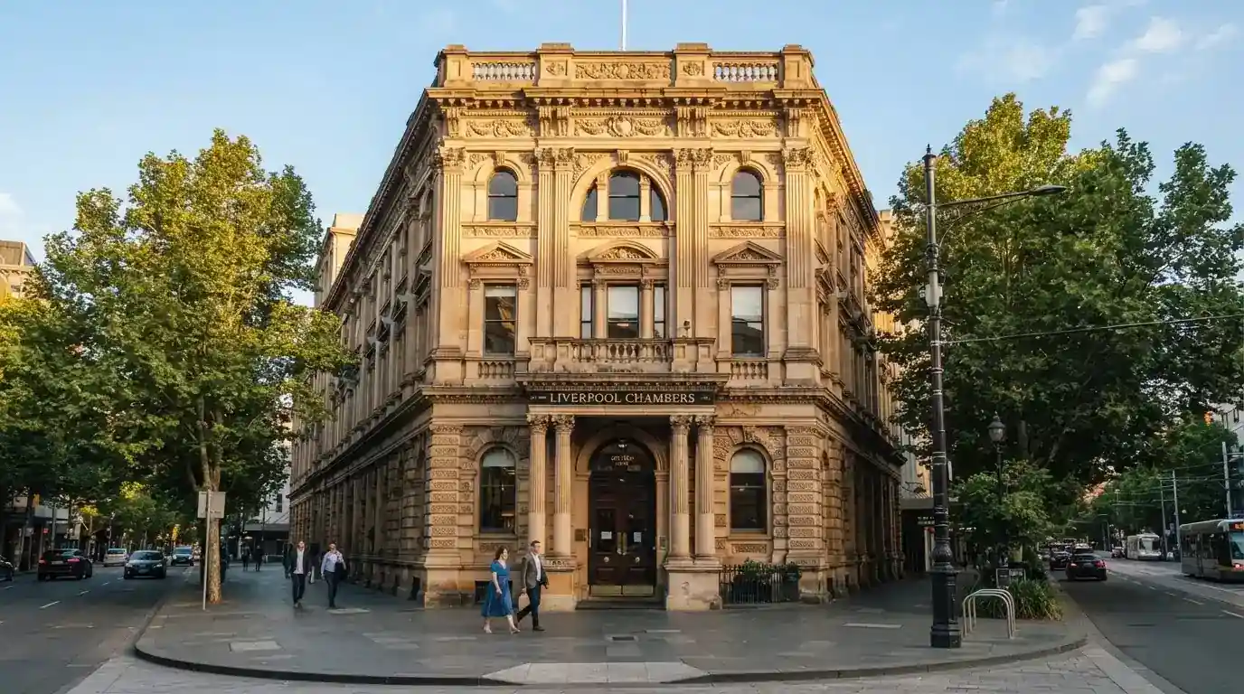 Sandstone heritage façade of the Treasury building on William Street, Brisbane